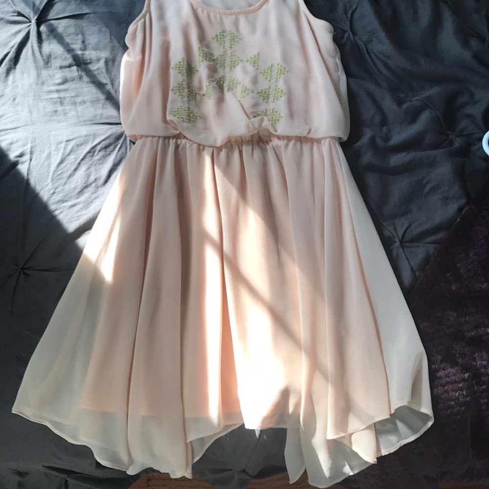 Light pink dress with gold detail